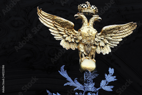 Golden two-headed eagle on Winter Palace gates. St. Petersburg