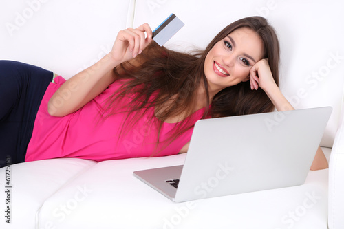 Beautiful young woman lying