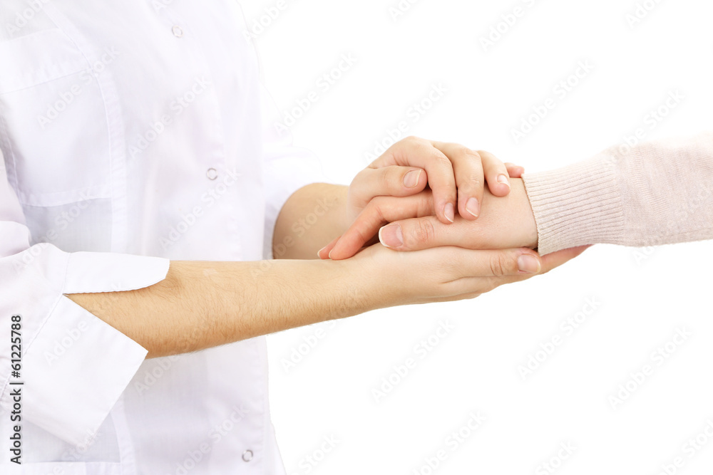 Medical doctor holding hand of patient, isolated on white Medical doctor holding hand of patient, isolated on white