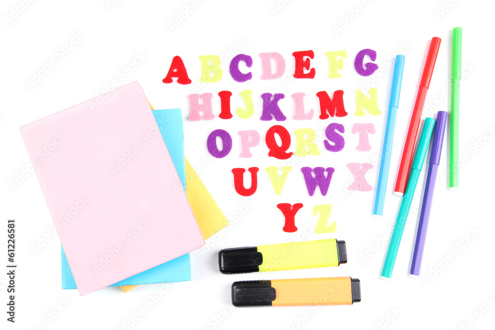 English alphabet, books and markers, isolated on white English alphabet, books and markers, isolated on white