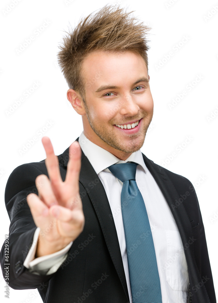 Half-length portrait of peace gesturing businessman Half-length portrait of peace gesturing businessman