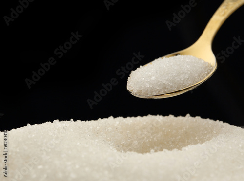 White sugar and spoon