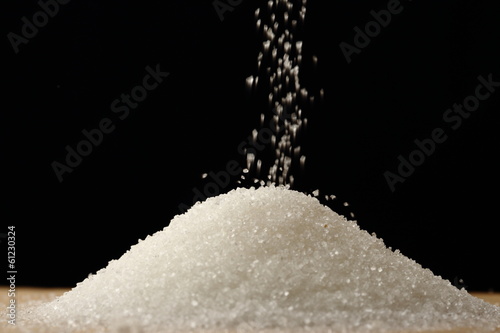 Flow of white sugar