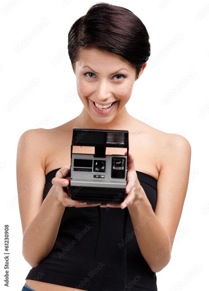 Girl takes snapshots with cassette photographic camera Girl takes snapshots with cassette photographic camera