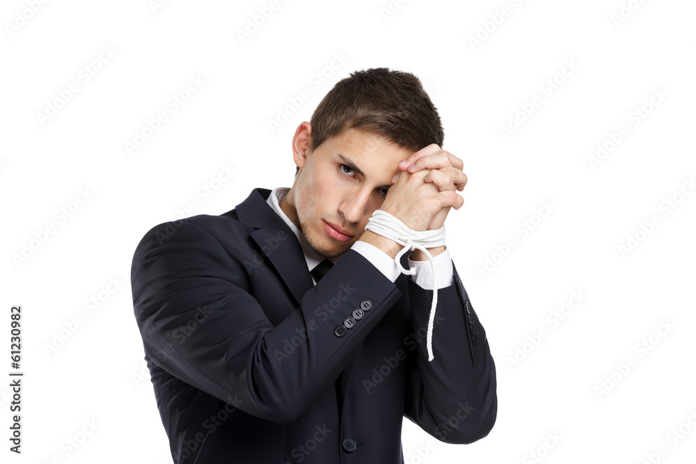 Half-length portrait of businessman with bound hands Half-length portrait of businessman with bound hands