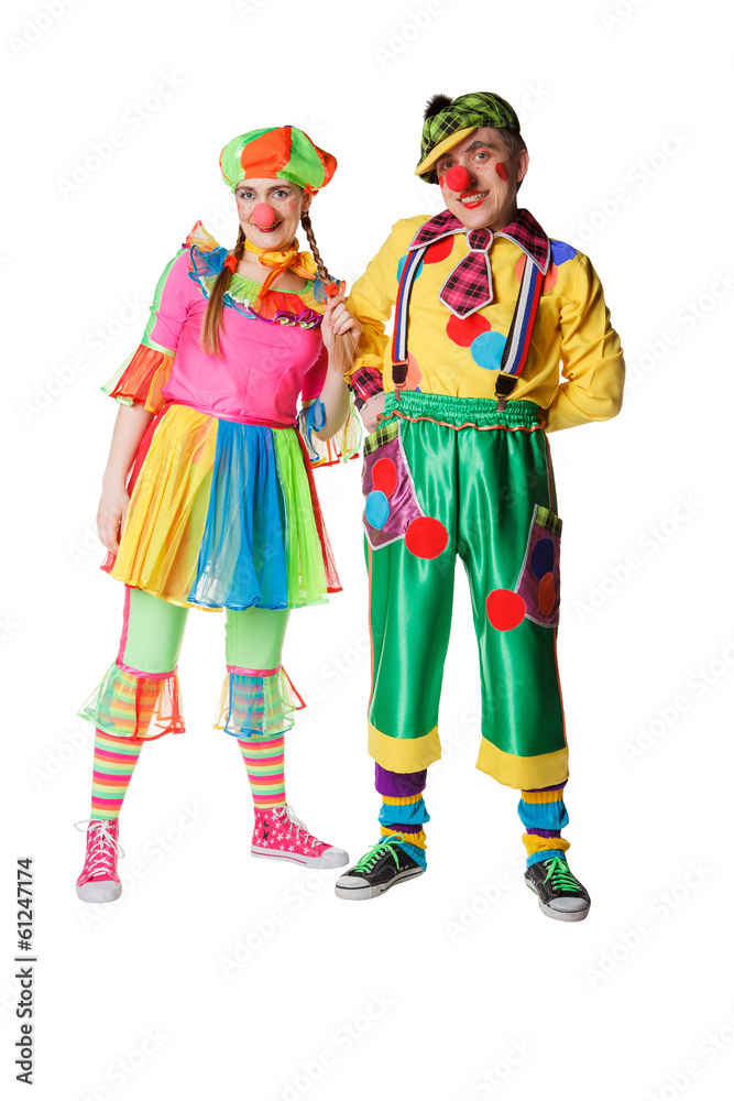 Two clown smiling isolated over a white background