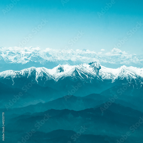 Snow Mountain Range Landscape with Blue Sky © SuriyaPhoto