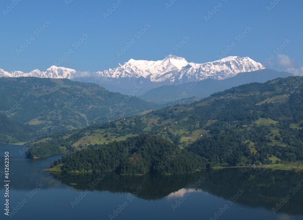 Snow capped Annapurna Range and lake Begnas Tal
