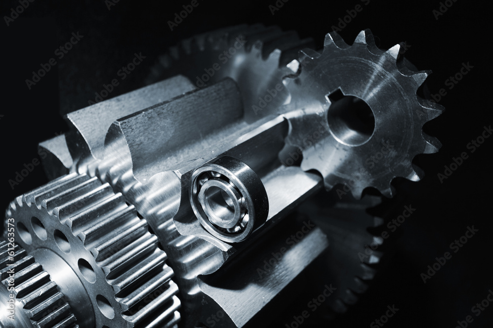 aerospace titanium gears against black background aerospace titanium gears against black background