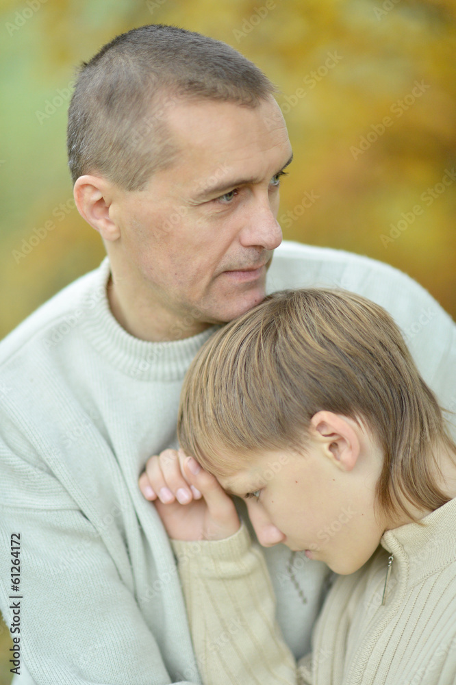 Sad father and boy