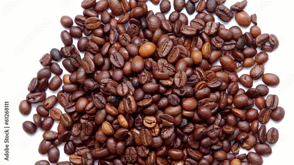 Coffee beans are spinning on the table