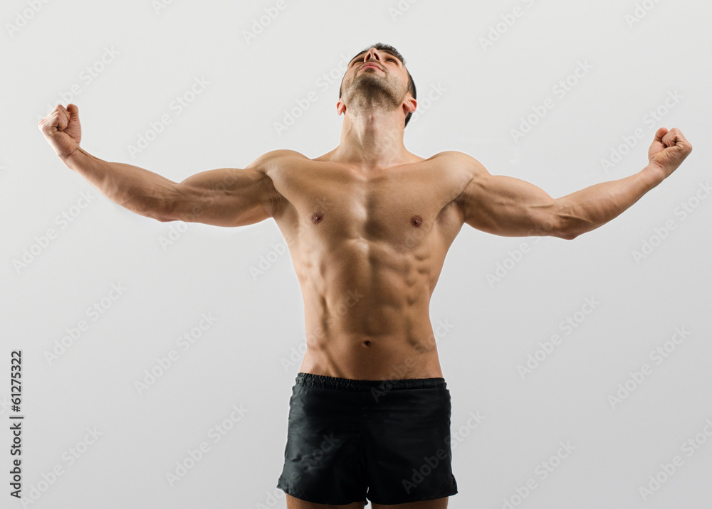 Fototapeta premium Bodybuilder with perfect abs, shoulders,biceps, triceps,chest
