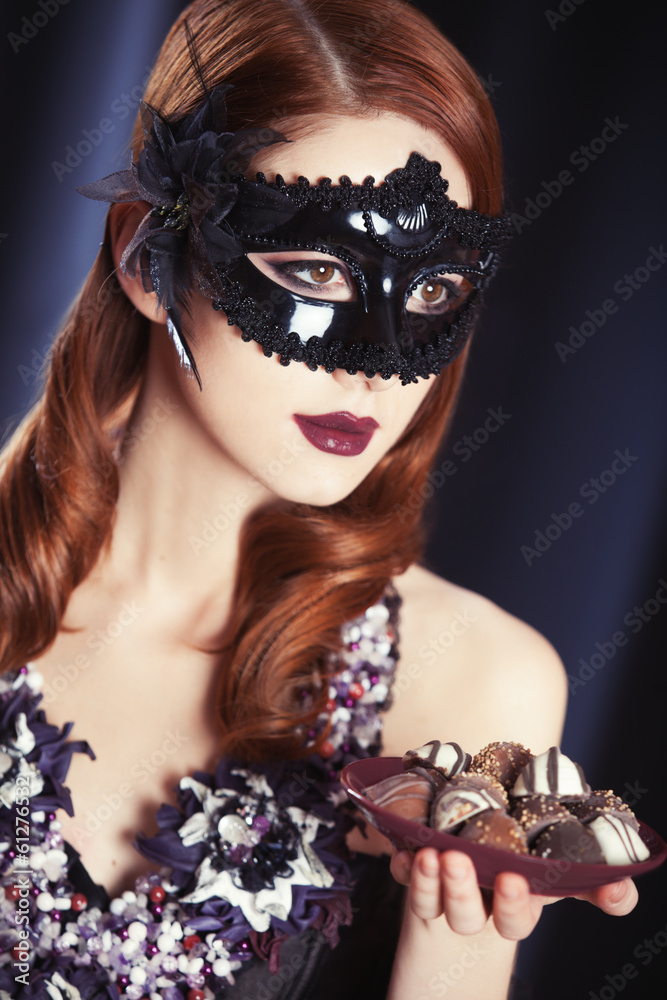 Beautiful women in carnival mask.