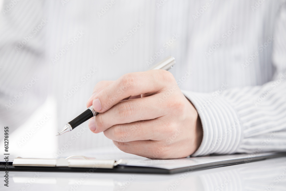 man hand with pen and business report