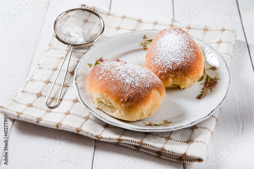 Freshly baked sweet buns with jam