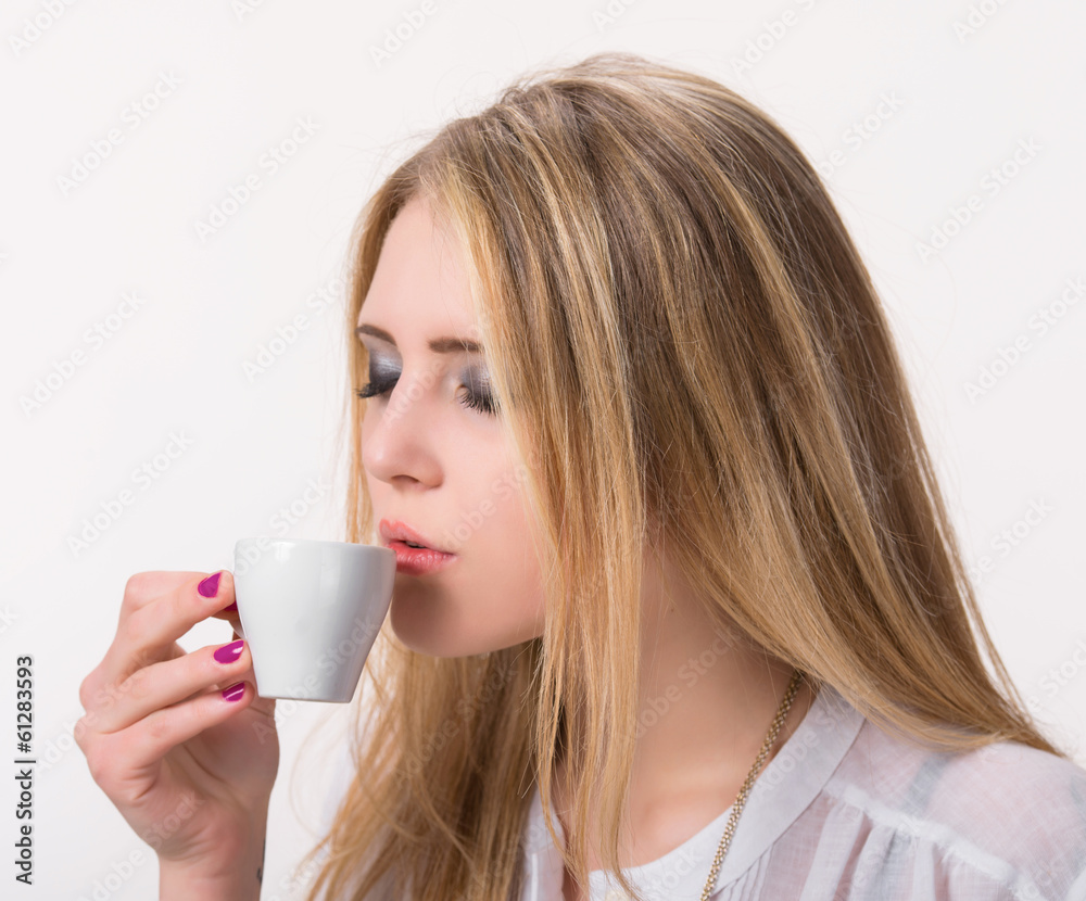 Beautiful girl enjoying coffee Beautiful girl enjoying coffee