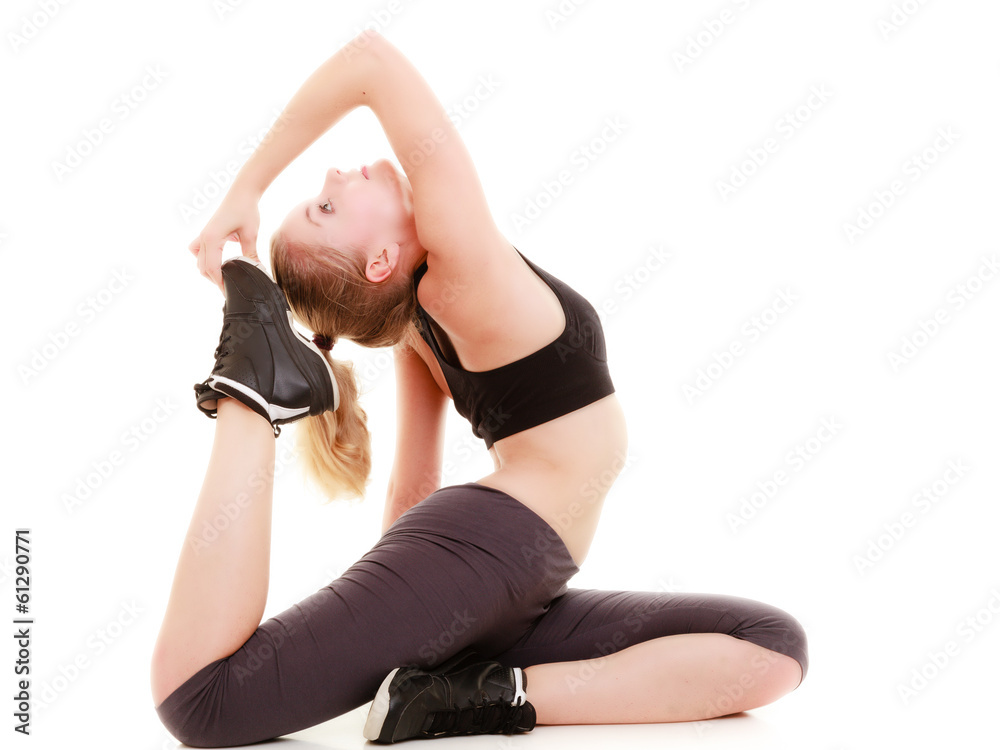 Fototapeta premium sporty girl doing stretching exercise. Healthy lifestyle