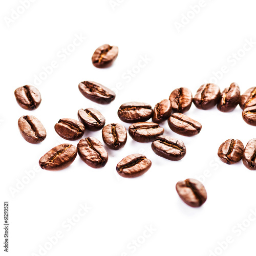 Roasted Coffee beans Isolated on white background macro.