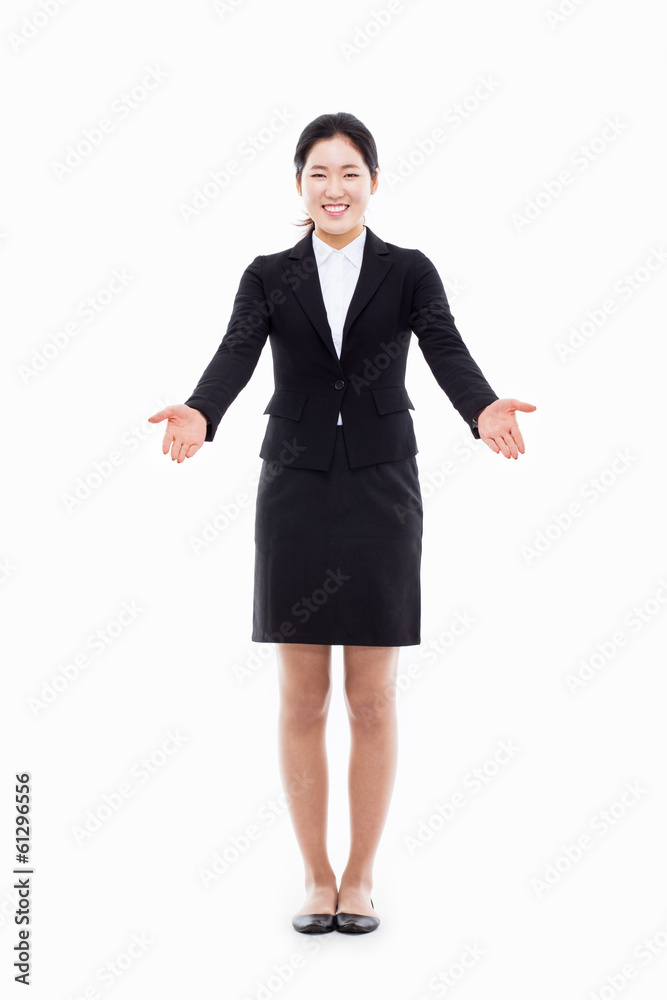 Young Asian business woman spread her arms. Young Asian business woman spread her arms.