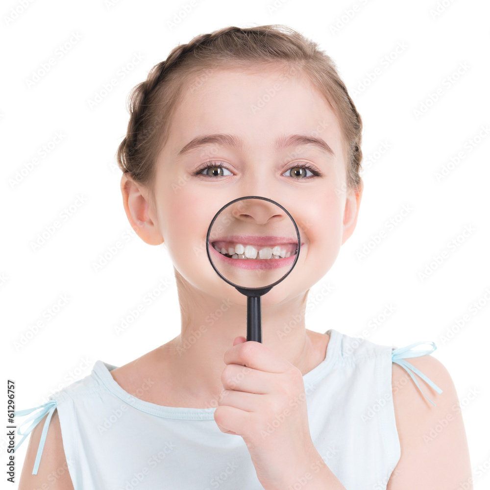 Close-up portrait of little girl showing teeth through a magnify Close-up portrait of little girl showing teeth through a magnify