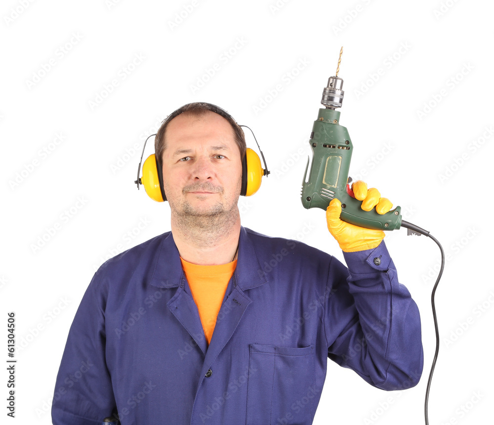 Worker on ladder with drill. Worker on ladder with drill.