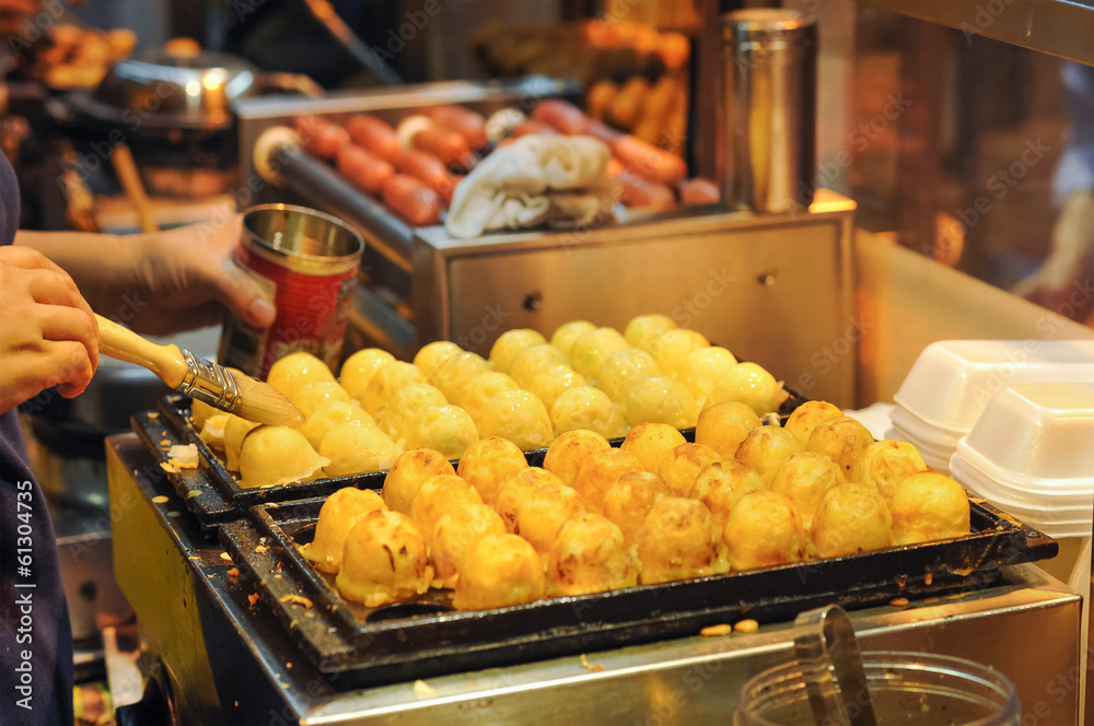 Naklejka premium Japanese Octopus Balls at Hong Kong Street Food Stall