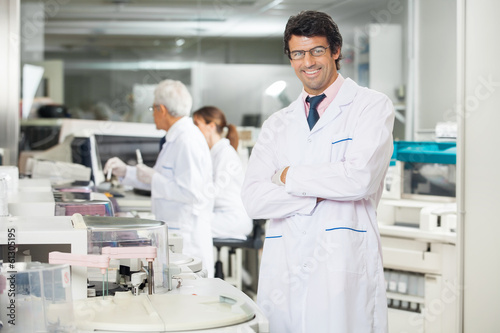 Researcher Standing Arms Crossed