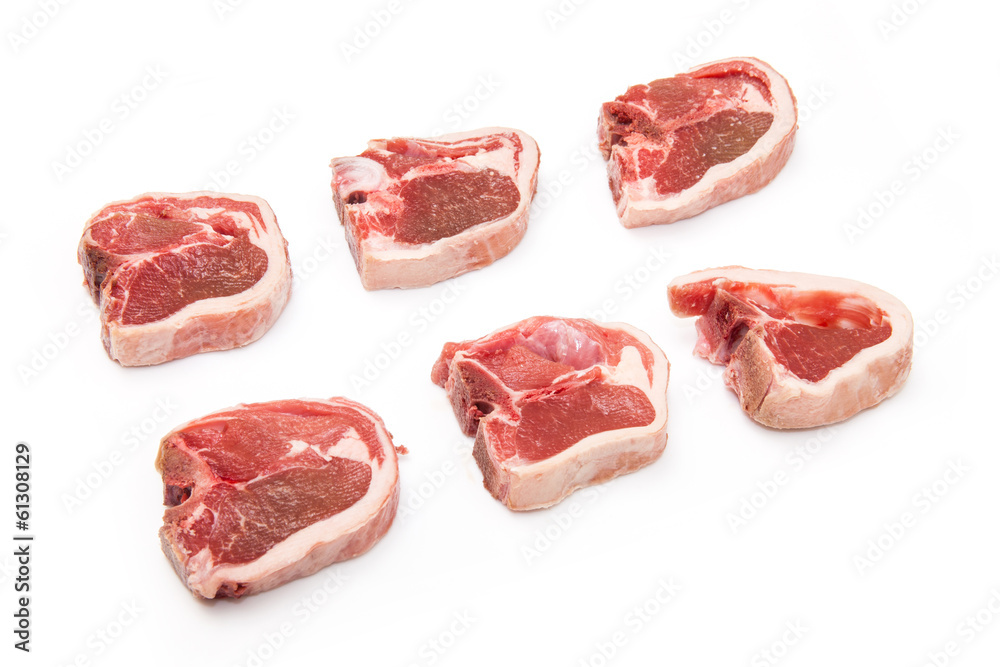 lamb chops isolated on a white studio background. lamb chops isolated on a white studio background.