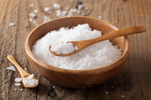 sea salt in wooden bowl and spoon