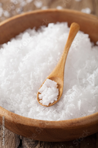 sea salt in wooden bowl and spoon