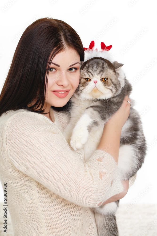 Portrait of a beautiful young woman and a large cat,on white