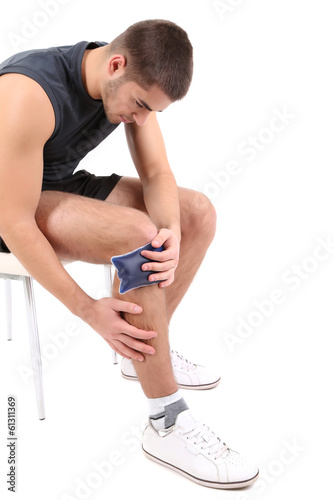 Young man with knee pain, i...