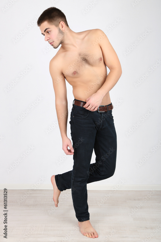 Handsome young man on light background