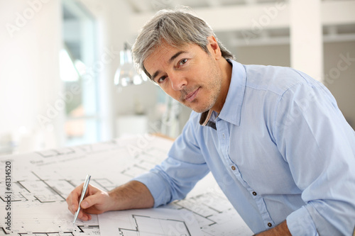 Portrait of smiling architect working in office