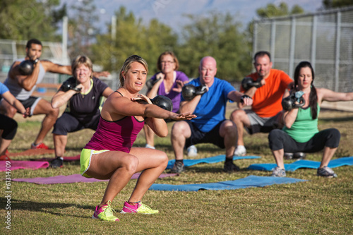 Mixed Group Doing Boot Camp Exercise