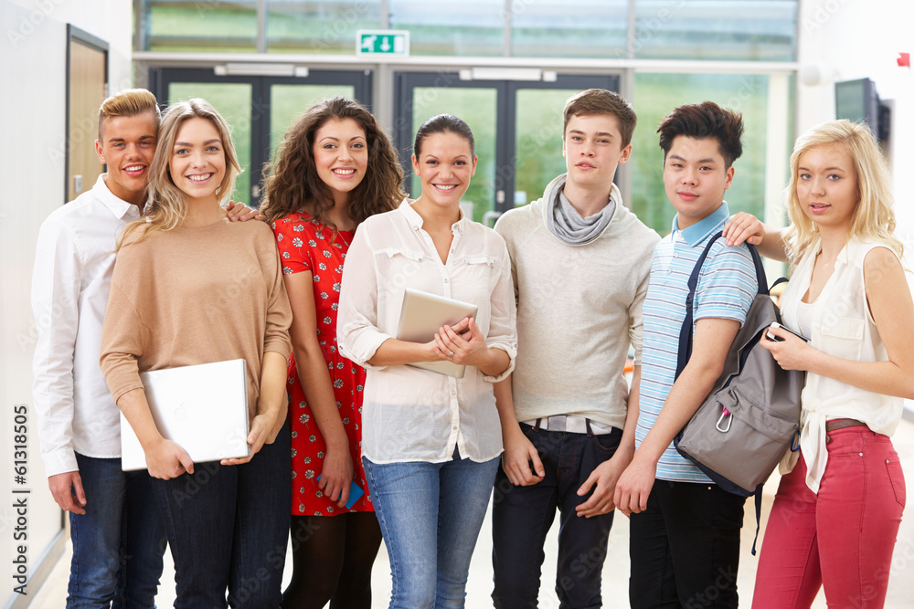 Fototapeta premium Portrait Of Female Tutor In Class With Students