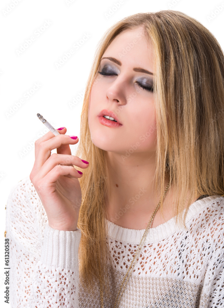 Fototapeta premium Smoking young girl