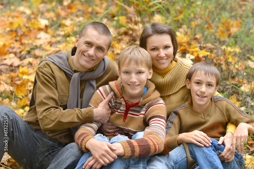 Happy family in the autumn park