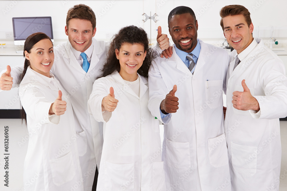 Portrait Of Laboratory Technicians Standing In Group