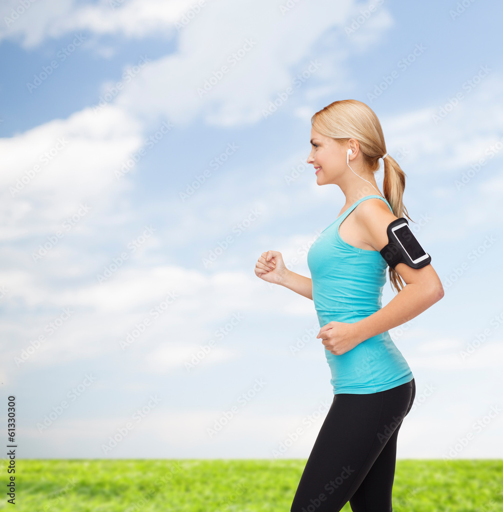sporty woman running with smartphone and earphones sporty woman running with smartphone and earphones