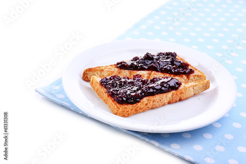 Delicious toast with jam on plate isolated on white
