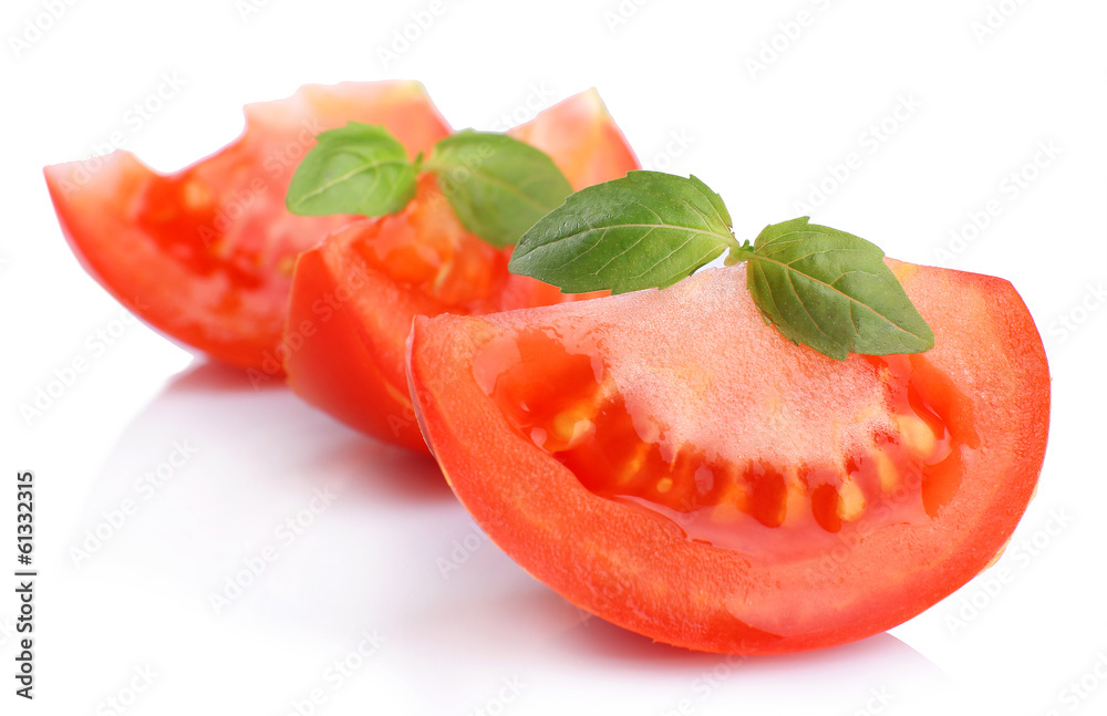 Slices of fresh tomato with basil, isolated on white
