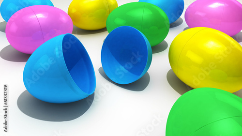 A collection of plastic Easter Eggs over a white background