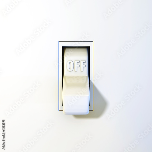 Close up of a wall light switch in the off position
