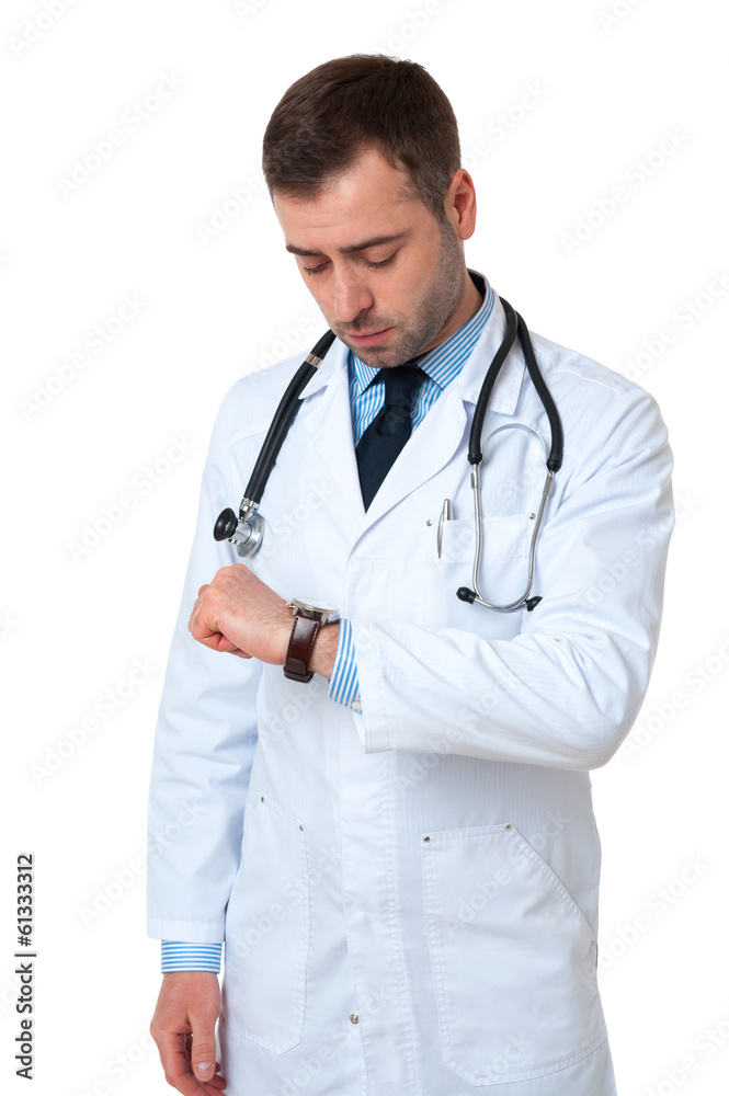 Mature male doctor checking time isolated on white background. S Mature male doctor checking time isolated on white background. S