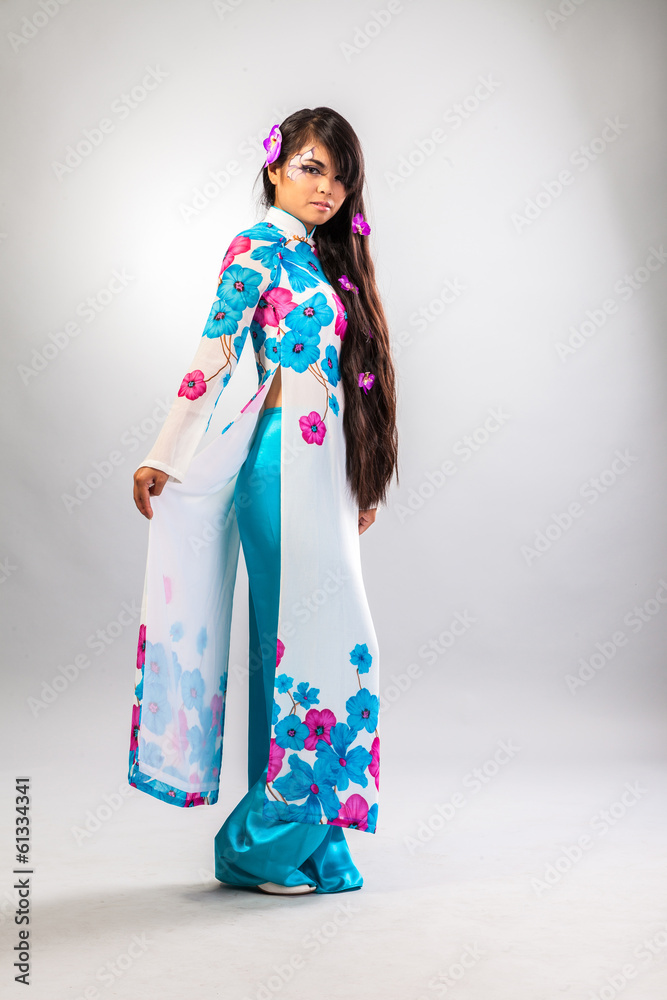 Beautiful asian woman wears a national dress Beautiful asian woman wears a national dress