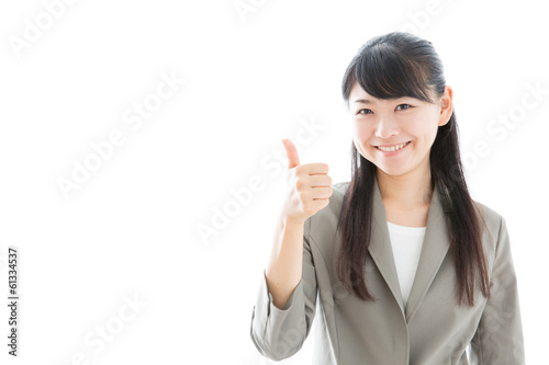 young asian businesswoman showing thumb up
