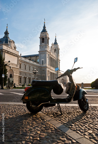 Italian scooter in Santa Maria la Real de La Almudena cathedral photo