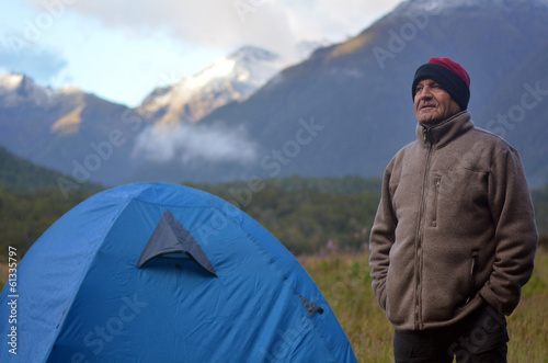 Mature man camping