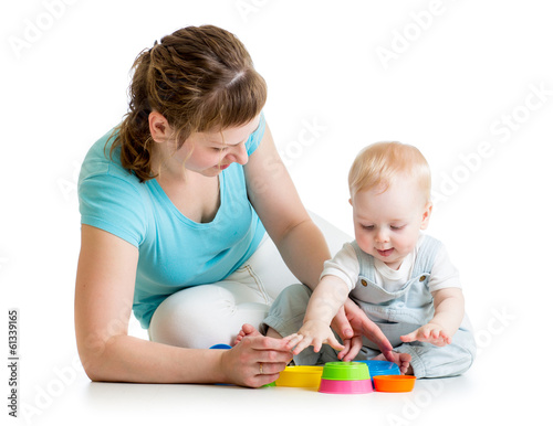 kid boy and mother play wit...